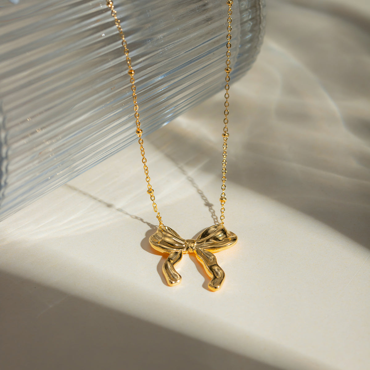 Gold Bow Pendant Necklace